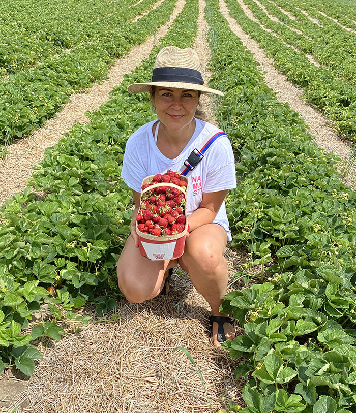 Me picking strawberries